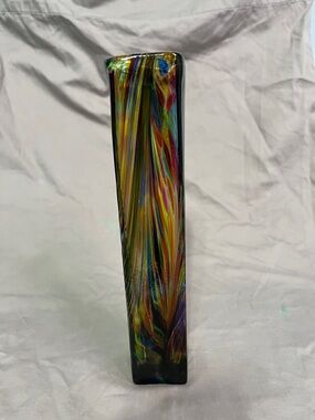 Colorful art glass vase, in the style of hand-blown "peacock" glass.
